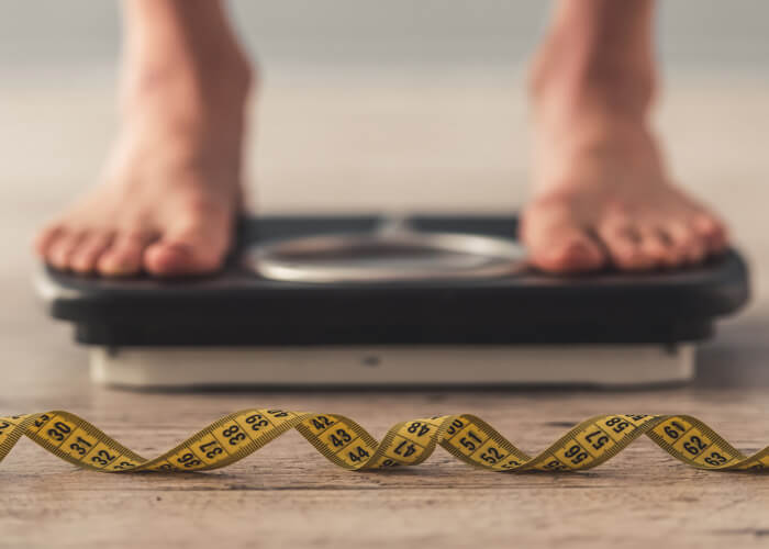 What causes perimenopausal weight gain?