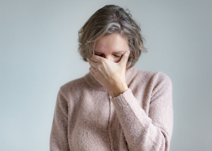 Are headaches a common symptom of menopause?