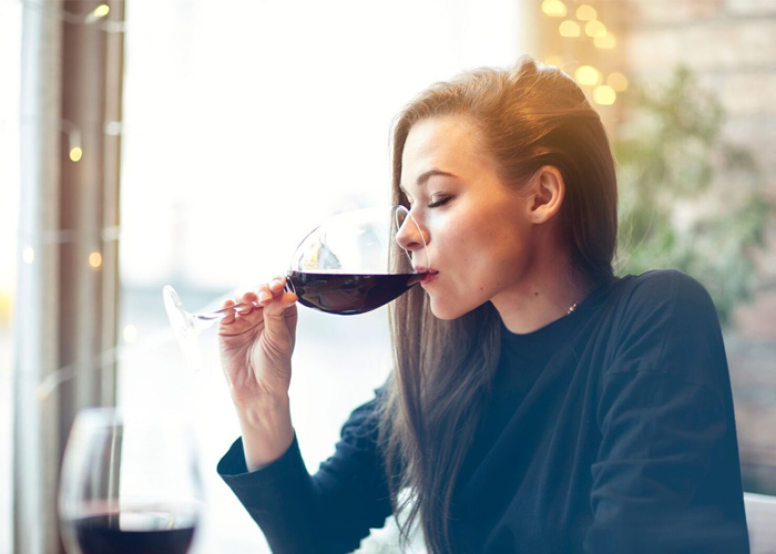 Can alcohol cause PMS?